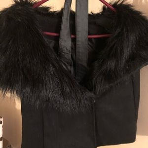 Vest with Faux fur and a Faux leather belt.